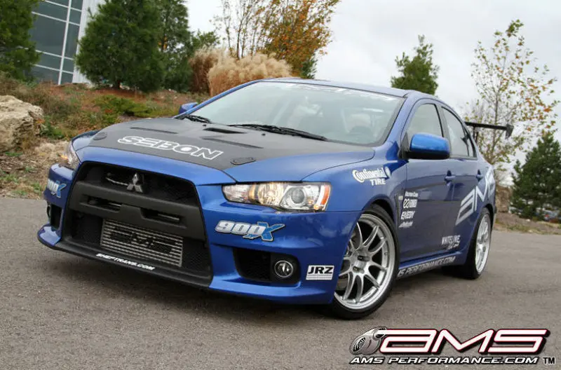 AMS AMSAMS.04.09.0001-1 Performance 08-15 Mitsubishi EVO X Front Mount Intercooler W/Modular Cast End Tanks & Logo №1